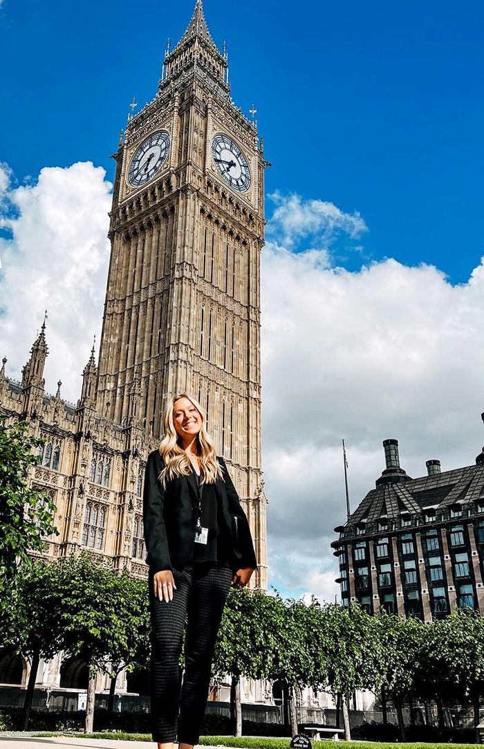 Perry takes a moment during work to take a photo with Big Ben in the background