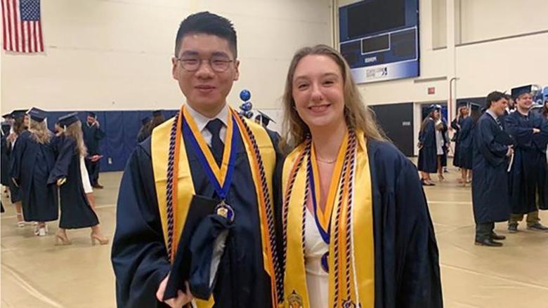 Jazzmine McCauley (left) with Ziwei (Will) Lin at the 2024 十大网投平台信誉排行榜阿尔图纳分校 spring commencement ceremony